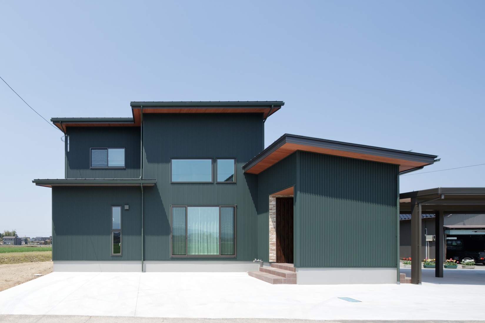 大きな吹き抜けと2階畳スペースのあるくつろぎの家